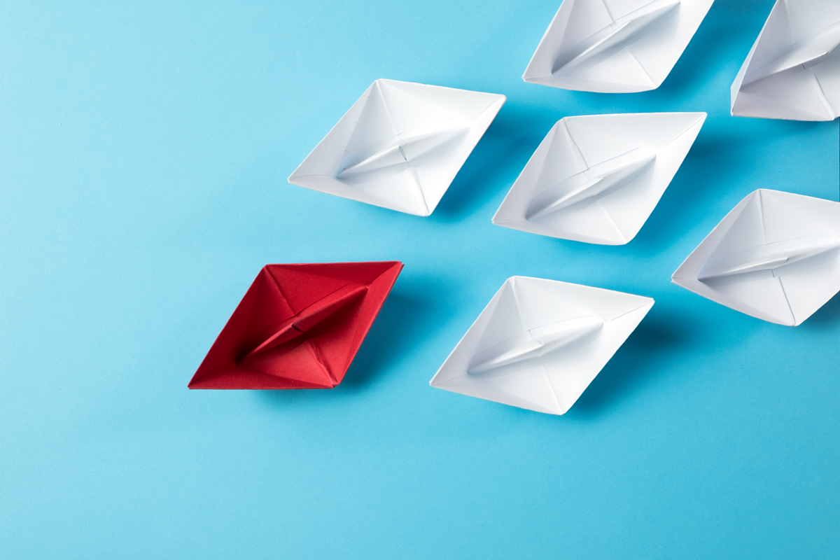 leadership-concept-using-origami-ship-2022-10-27-04-26-45-utc